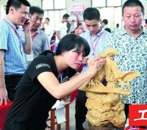  Exploring new markets , Quanzhou actively build carving wood carving arts industry clusters